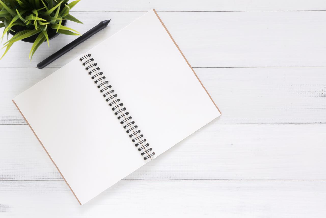 Minimal work space - Creative flat lay photo of workspace desk. White office desk wooden table background with open mock up notebooks and pens and plant. Top view with copy space, flat lay photography.